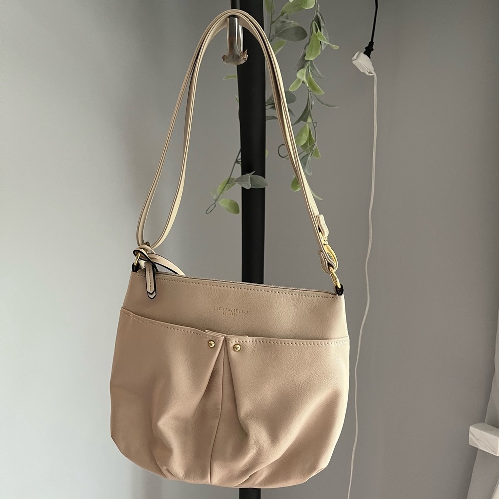 designer purse with gold accent